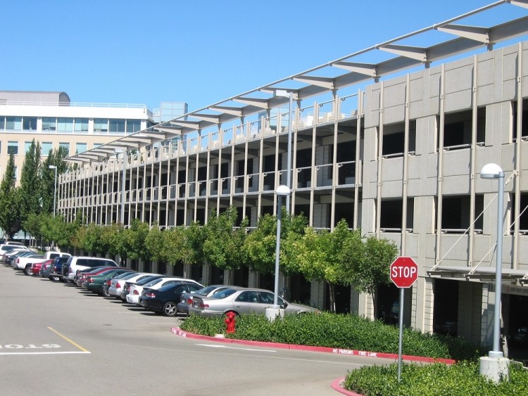 The parking structure is designed using post tension concrete slabs