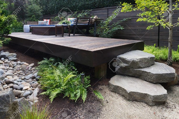 Chic Rock Garden mode San Francisco Asian Landscape Image Ideas with backyard bark mulch boulders deck