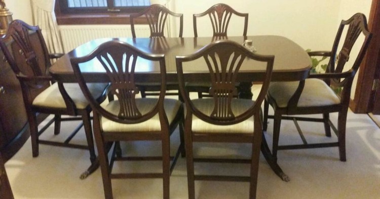 Stag dining table (extendable) with four chairs (two are carver chairs)) excellent condition
