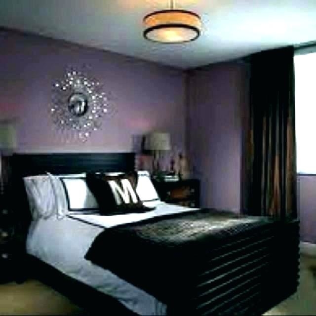 Give your bedroom a modern glam feel by decorating with a black and white color scheme