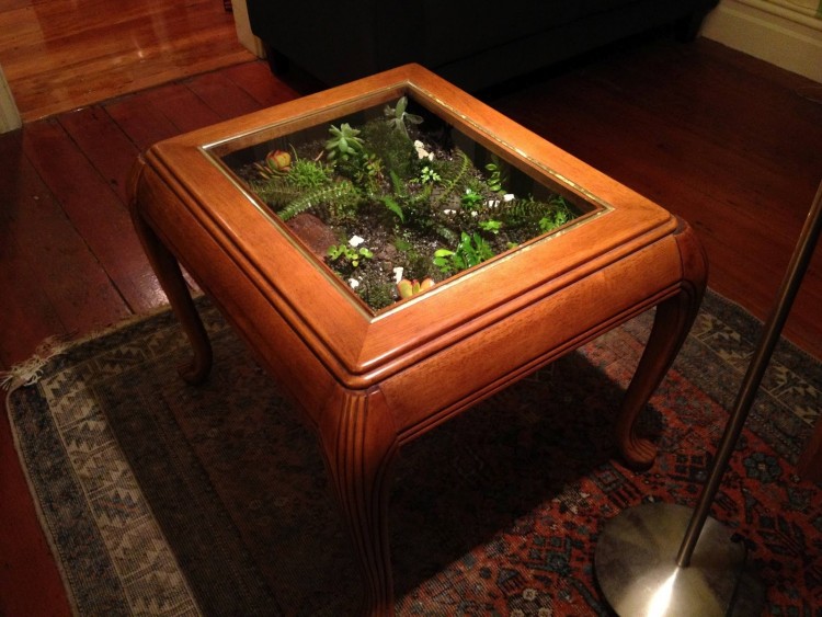 Our first cool coffee table idea is a suitcase DIY coffee table by 'The Ruche Blog'