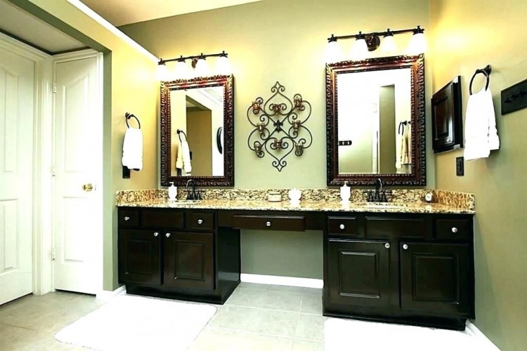 Clean and bright, grey floors, white subway tile, bronze fixtures