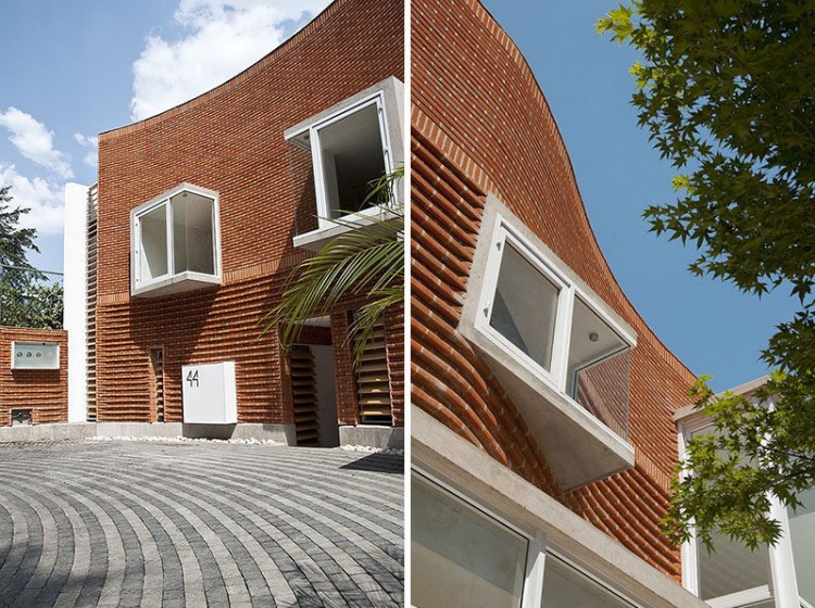 Brick Curtain House by Design Work Group