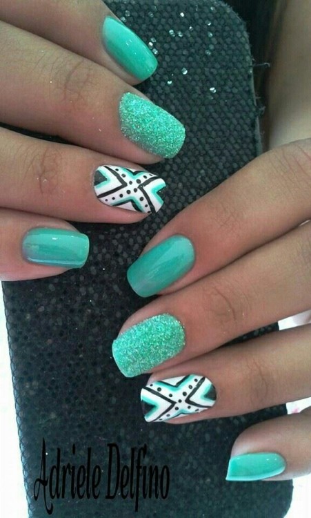 Mint green gel with freehand flower nail art