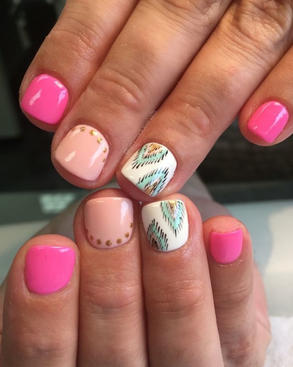 short red nails, short white striped nails adorned with some crystals, and  short black 2