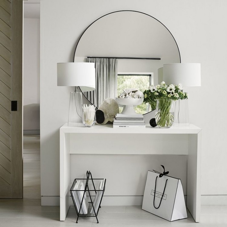 Large round mirror with modern bench