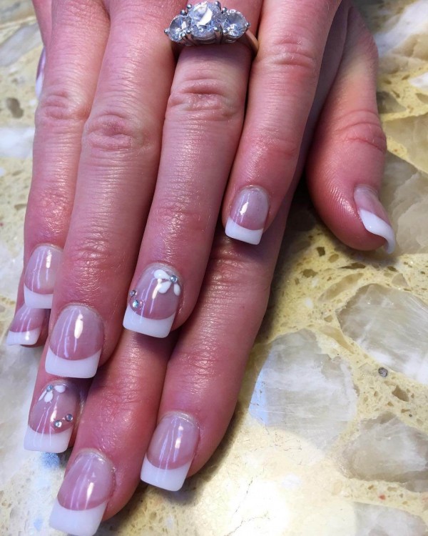 The nails are coated with clear polish as base