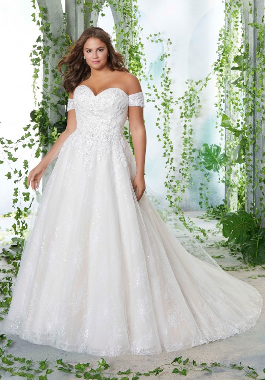 plus size bride in boho chic wedding dress; curvy bride in sexy slit wedding dress