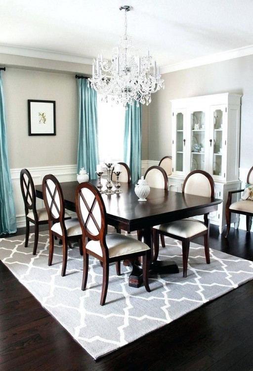 dining room dark wood floors an ornate southwestern style archway leads from the