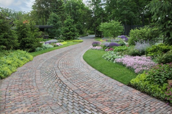 Plants along cobblestone driveway