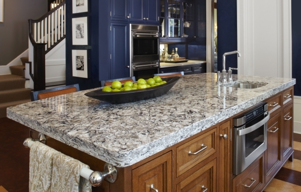 Kitchen with thick White Quartzite Countertop and farmhouse sink