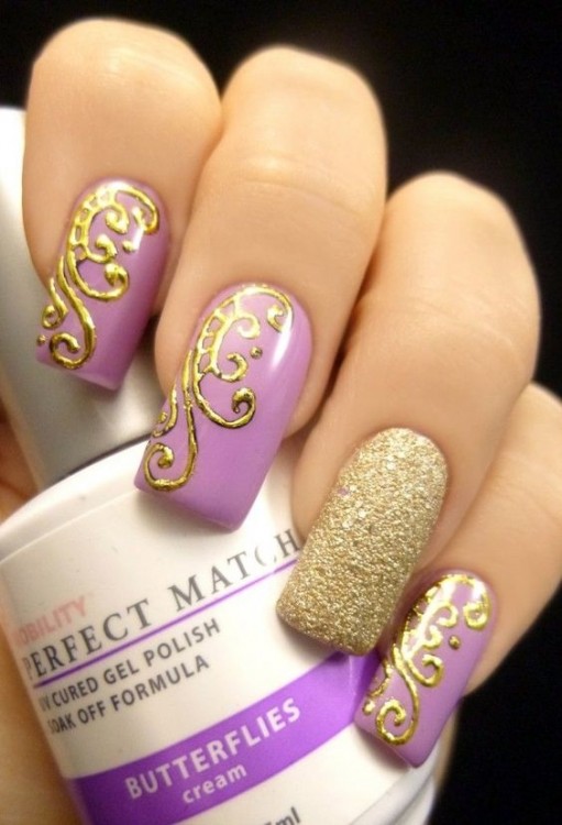 A perfect example of an ombre gel nail design using purple shades looks  incredibly beautiful