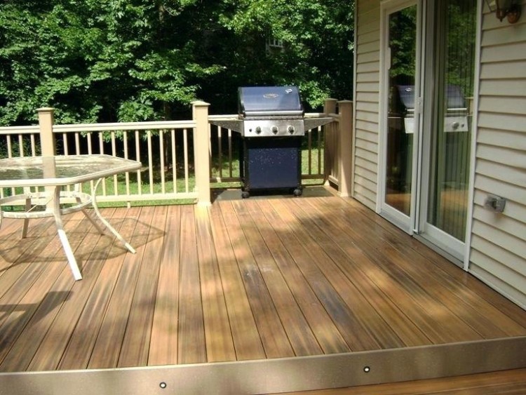 stacked stone enclosure, and stone & cedar privacy screen, this kitchen has all the fixings! From “Decked Out” project “The BBQ Deck”