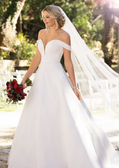 Blushing Bride in Her Pink Wedding Dress