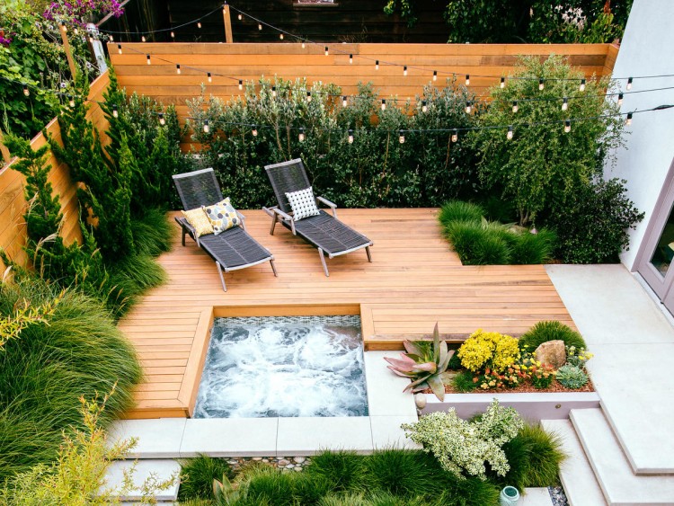 conversion of an old garage into a precious outdoor dining alcove