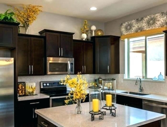 top of kitchen cabinet decor ideas kitchen cabinet decorating ideas best decorating above kitchen cabinets ideas