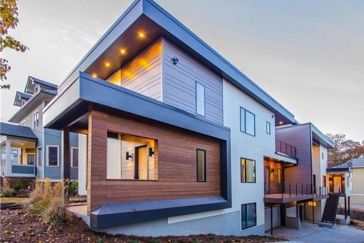 Chris Ernesto and Marianne Huber wanted to utilize the roof of their 1895 rowhouse on Capitol Hill, so their renovations included a rooftop deck