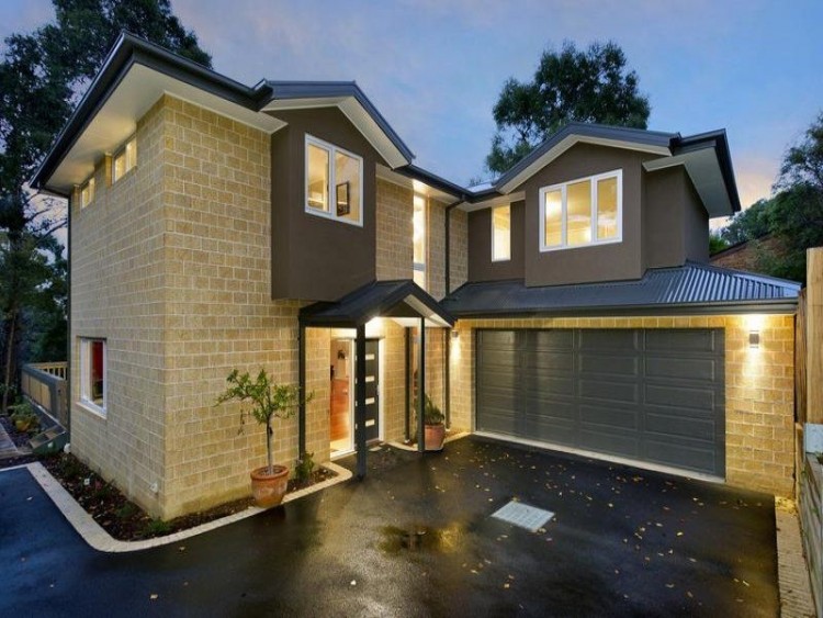 Facing the facade of a private house with a decorative stone